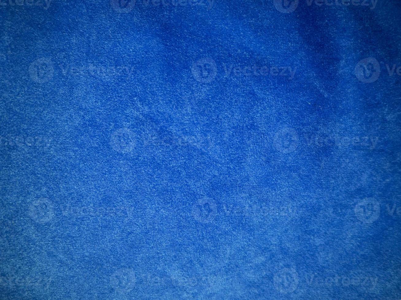 Blue velvet fabric texture used as background. Empty blue fabric background of soft and smooth textile material. There is space for text. photo
