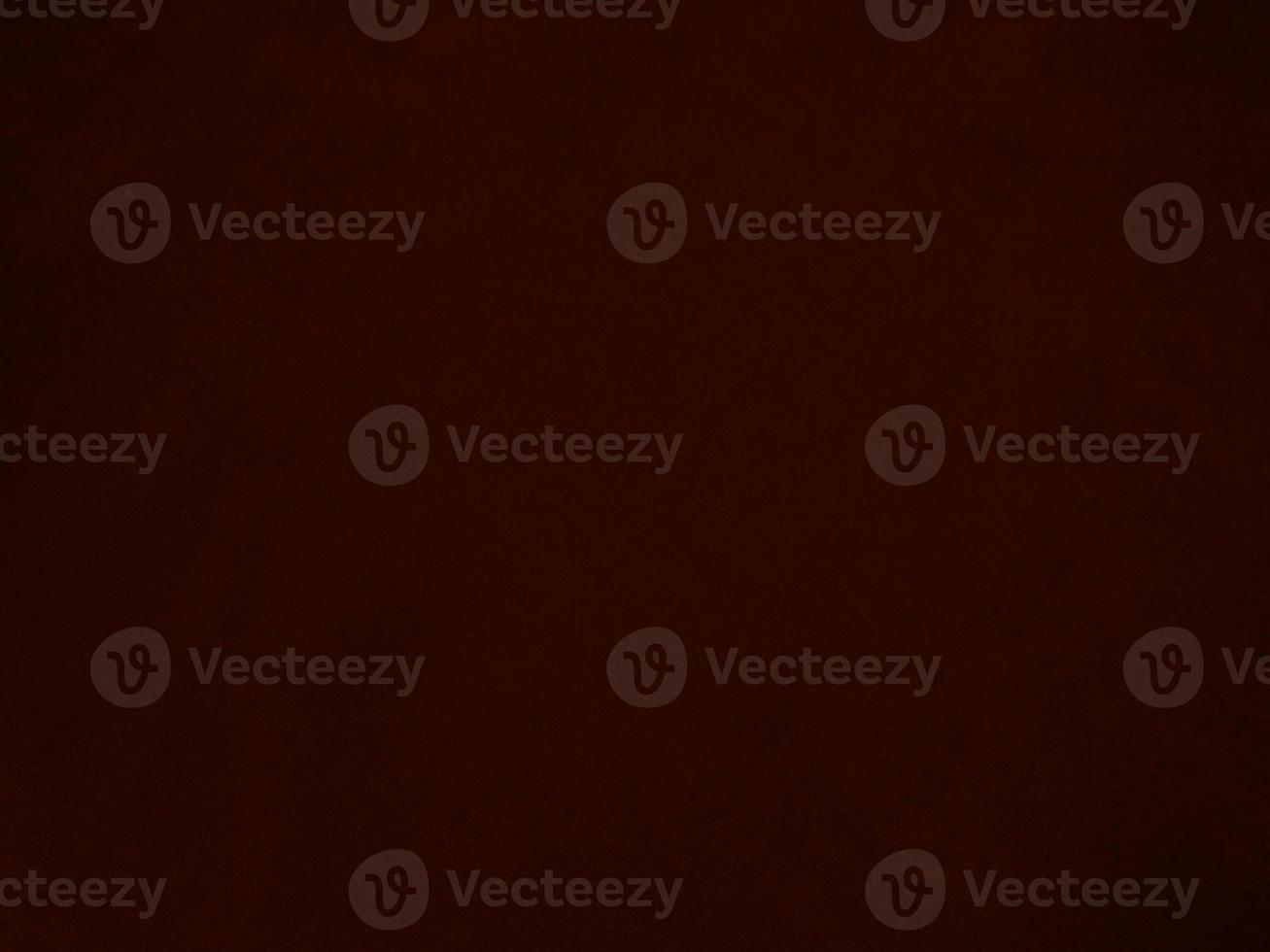 Dark red velvet fabric texture used as background. Empty dark red fabric background of soft and smooth textile material. There is space for text. photo