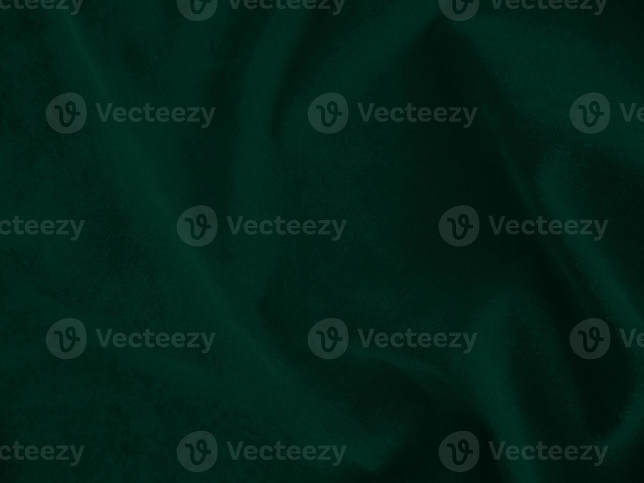 Dark green old velvet fabric texture used as background. Empty green fabric background of soft and smooth textile material. There is space for text.. photo