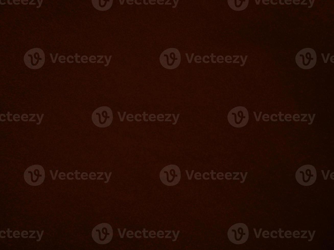 Dark red velvet fabric texture used as background. Empty dark red fabric background of soft and smooth textile material. There is space for text. photo