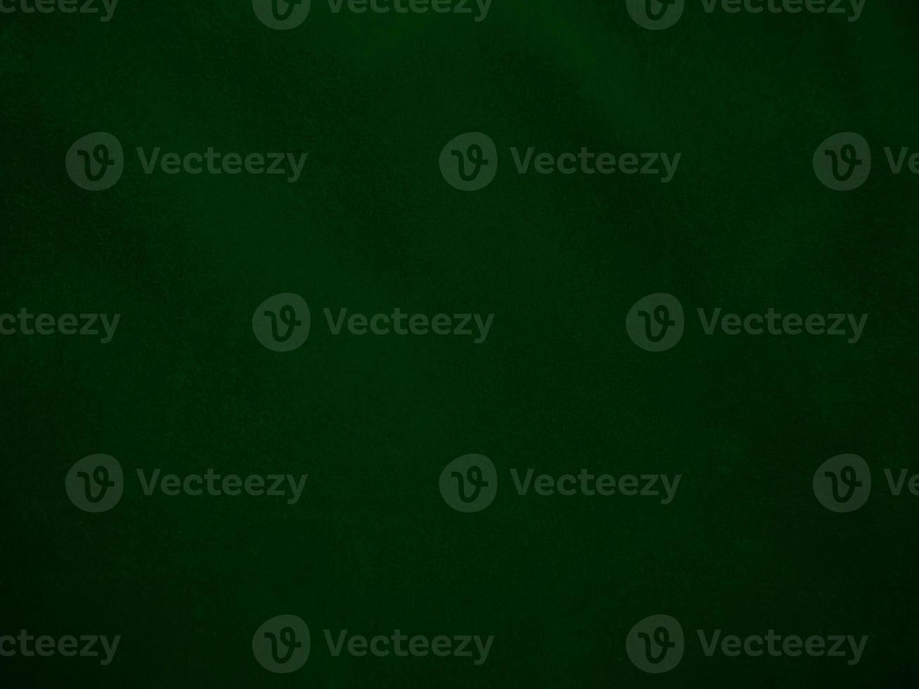Dark green old velvet fabric texture used as background. Empty green fabric background of soft and smooth textile material. There is space for text.. photo