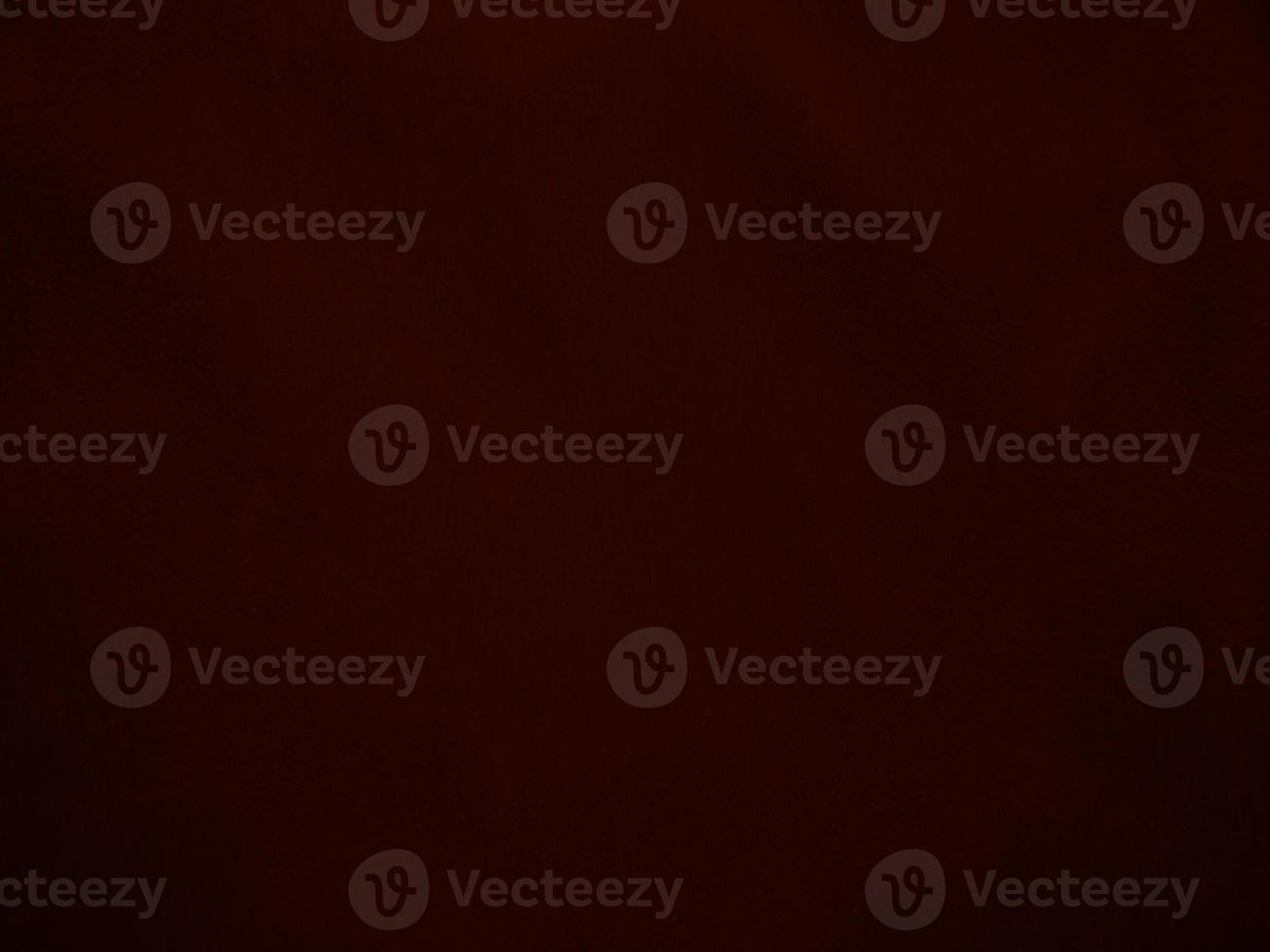 Dark red velvet fabric texture used as background. Empty dark red fabric background of soft and smooth textile material. There is space for text. photo