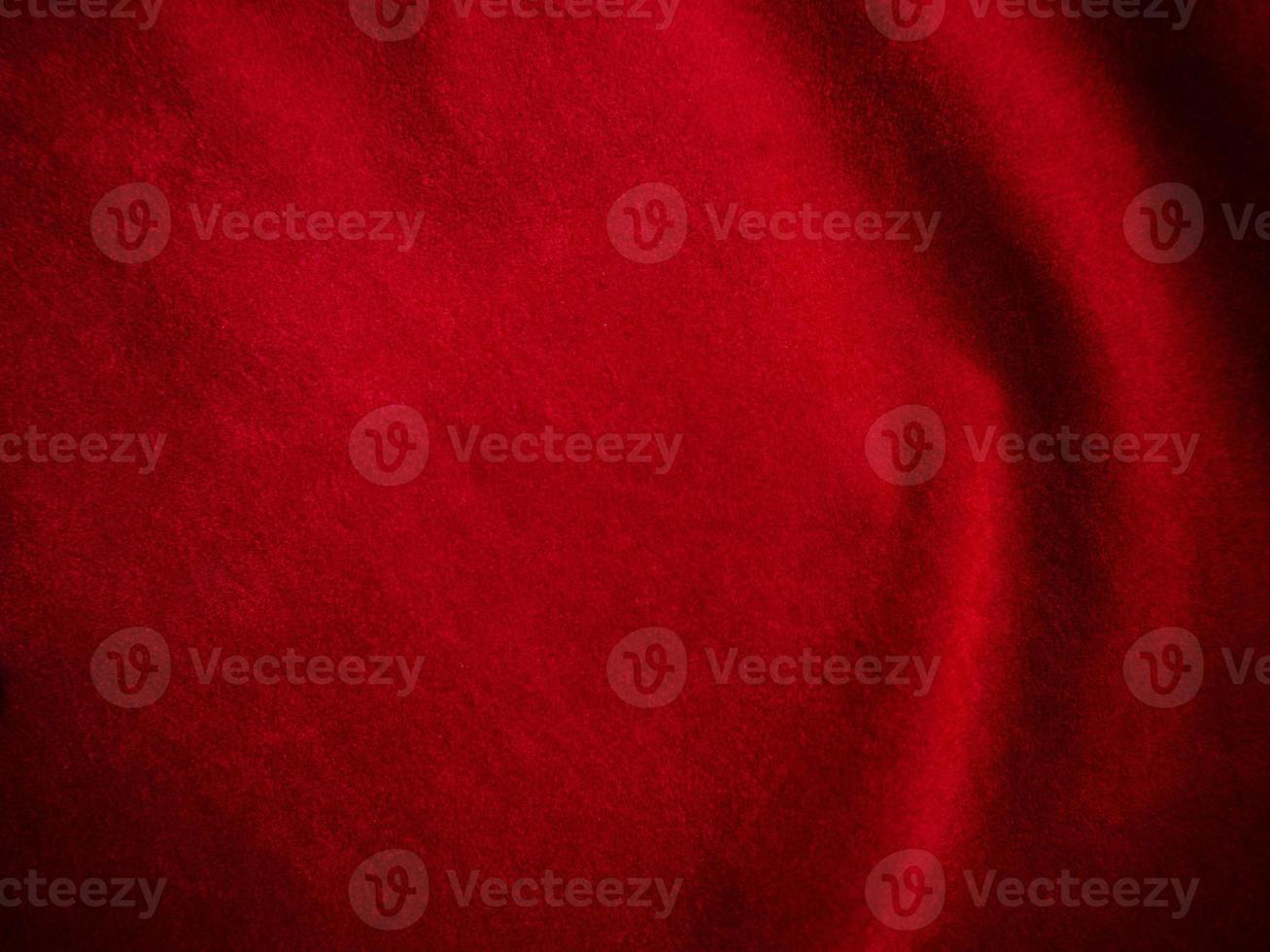 Dark red velvet fabric texture used as background. Empty dark red fabric background of soft and smooth textile material. There is space for text. photo