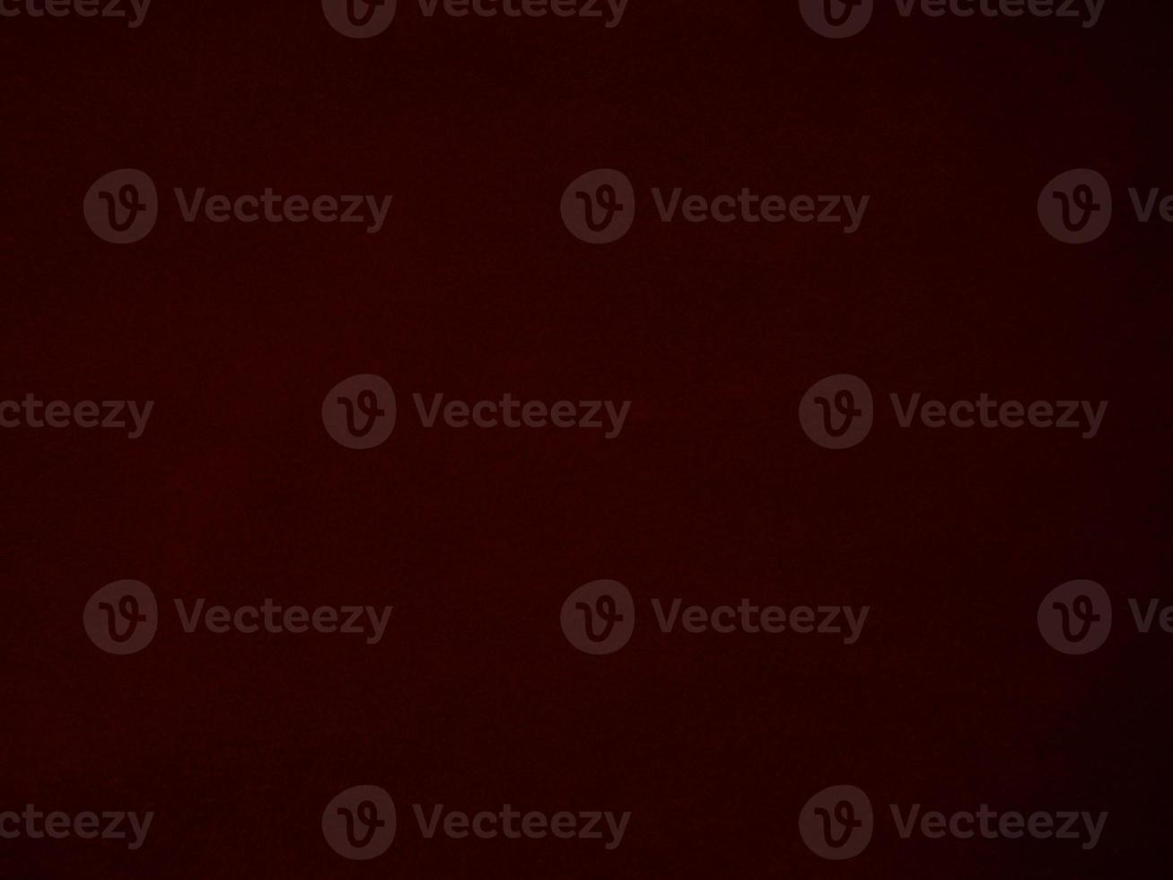 Dark red velvet fabric texture used as background. Empty dark red fabric background of soft and smooth textile material. There is space for text. photo