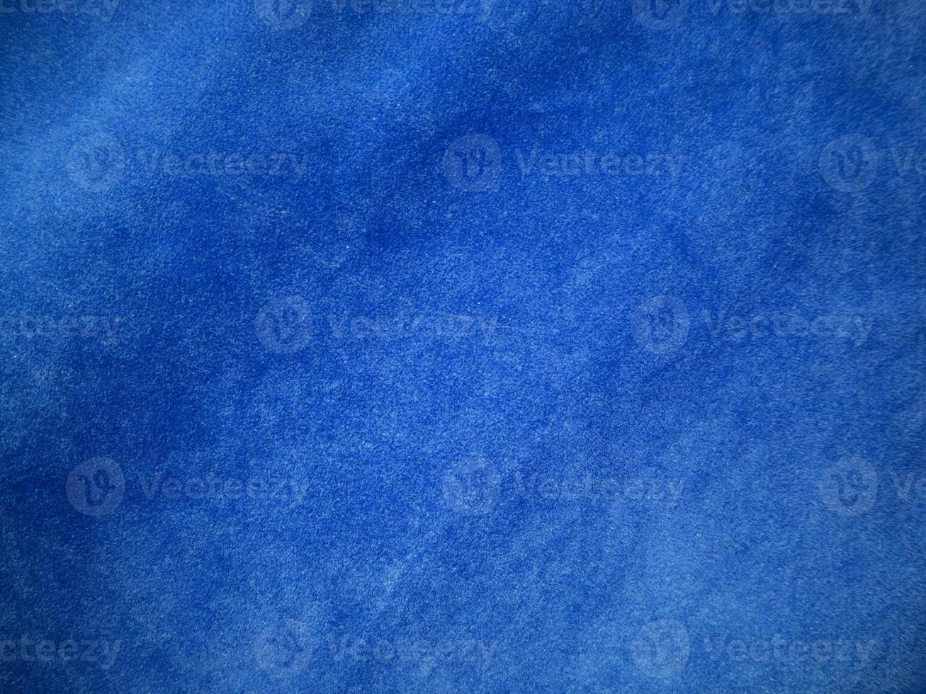 Blue velvet fabric texture used as background. Empty blue fabric background of soft and smooth textile material. There is space for text. photo
