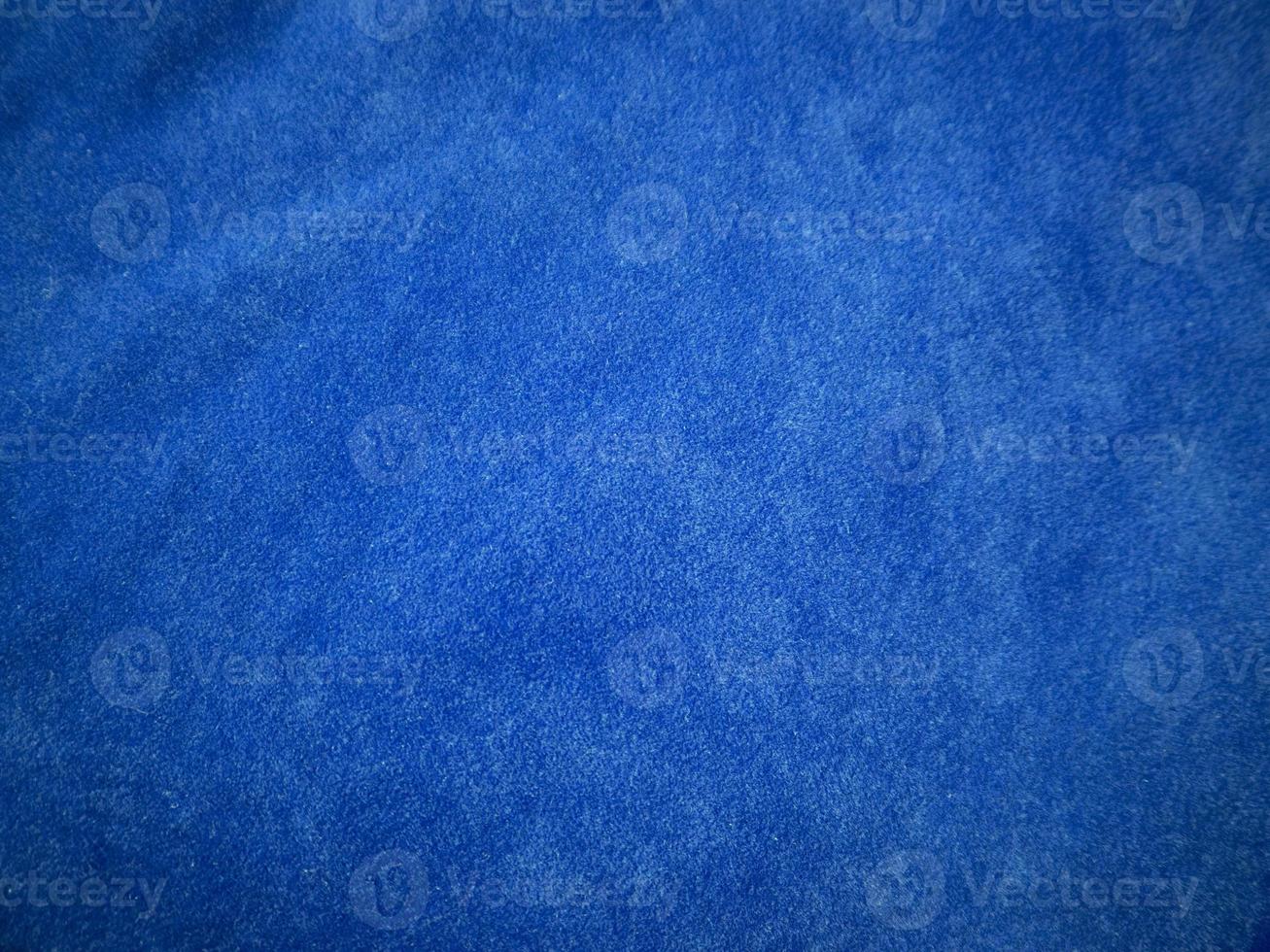 Blue velvet fabric texture used as background. Empty blue fabric background of soft and smooth textile material. There is space for text. photo