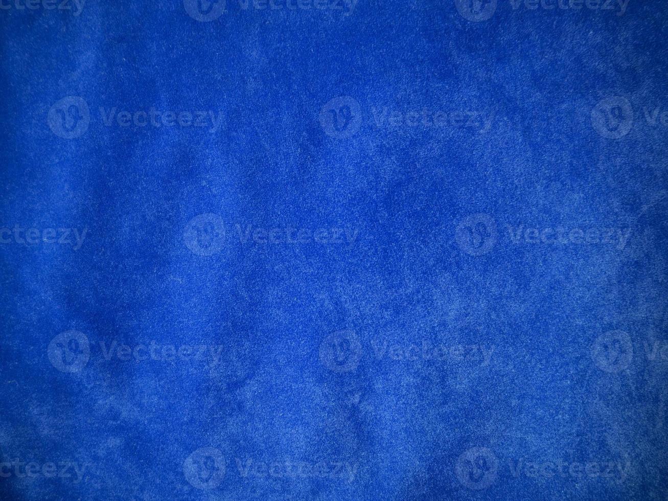 Blue velvet fabric texture used as background. Empty blue fabric background of soft and smooth textile material. There is space for text. photo