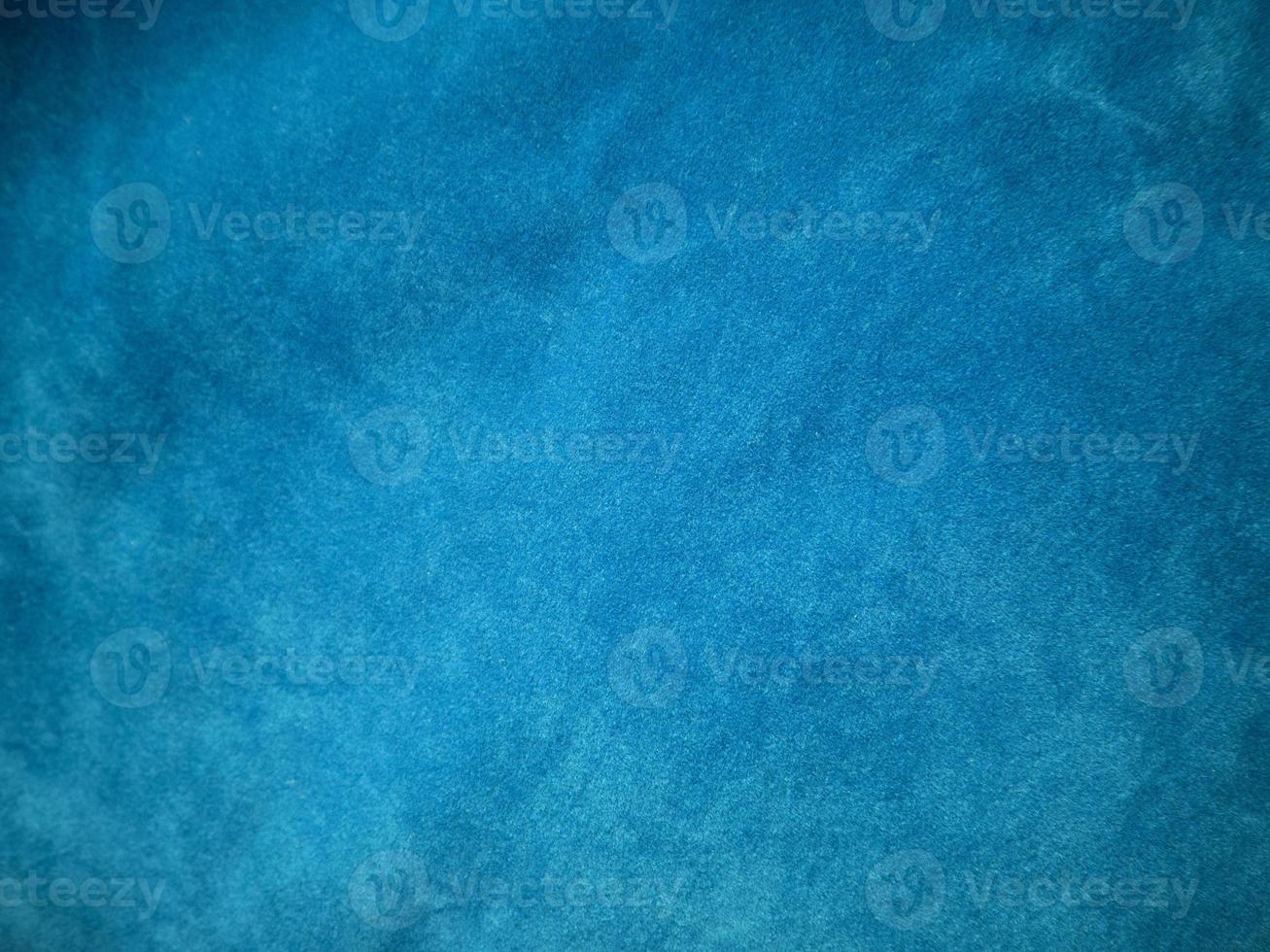 Blue velvet fabric texture used as background. Empty blue fabric background of soft and smooth textile material. There is space for text. photo