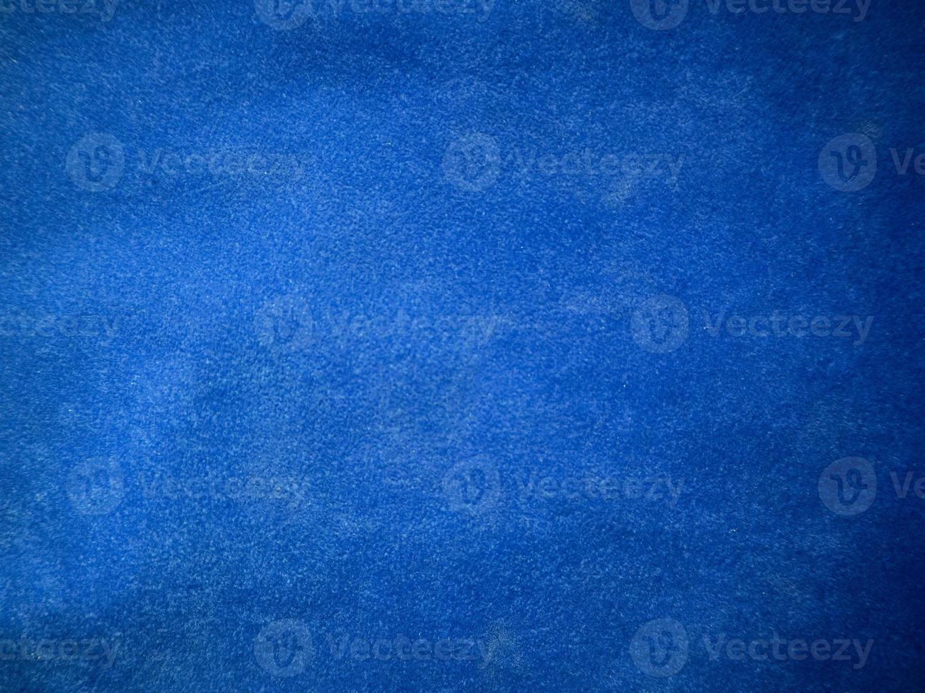 Blue velvet fabric texture used as background. Empty blue fabric background of soft and smooth textile material. There is space for text. photo