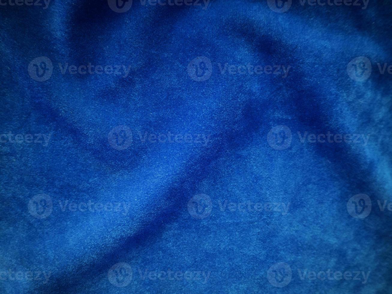 Blue velvet fabric texture used as background. Empty blue fabric background of soft and smooth textile material. There is space for text. photo
