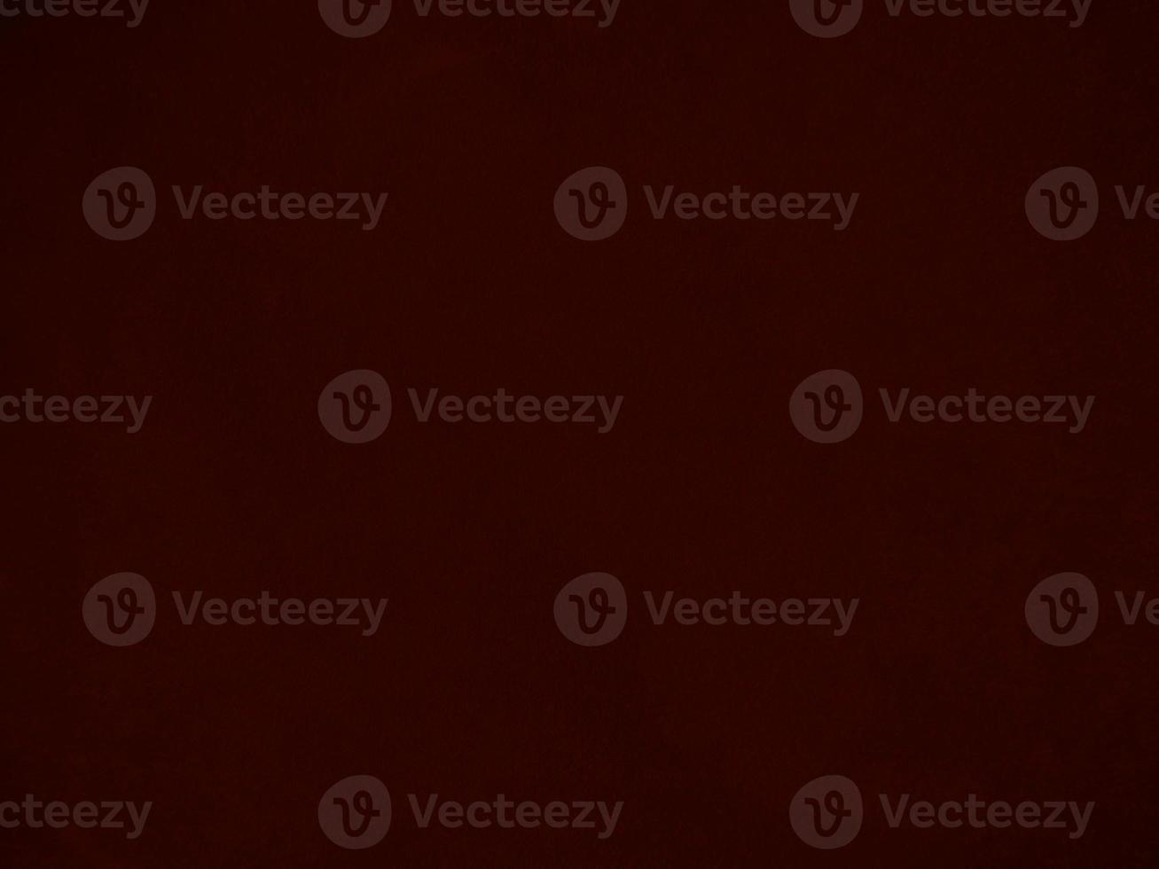 Dark red velvet fabric texture used as background. Empty dark red fabric background of soft and smooth textile material. There is space for text. photo