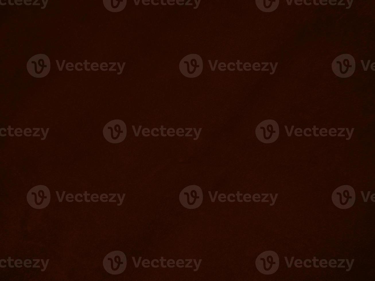 Dark red velvet fabric texture used as background. Empty dark red fabric background of soft and smooth textile material. There is space for text. photo