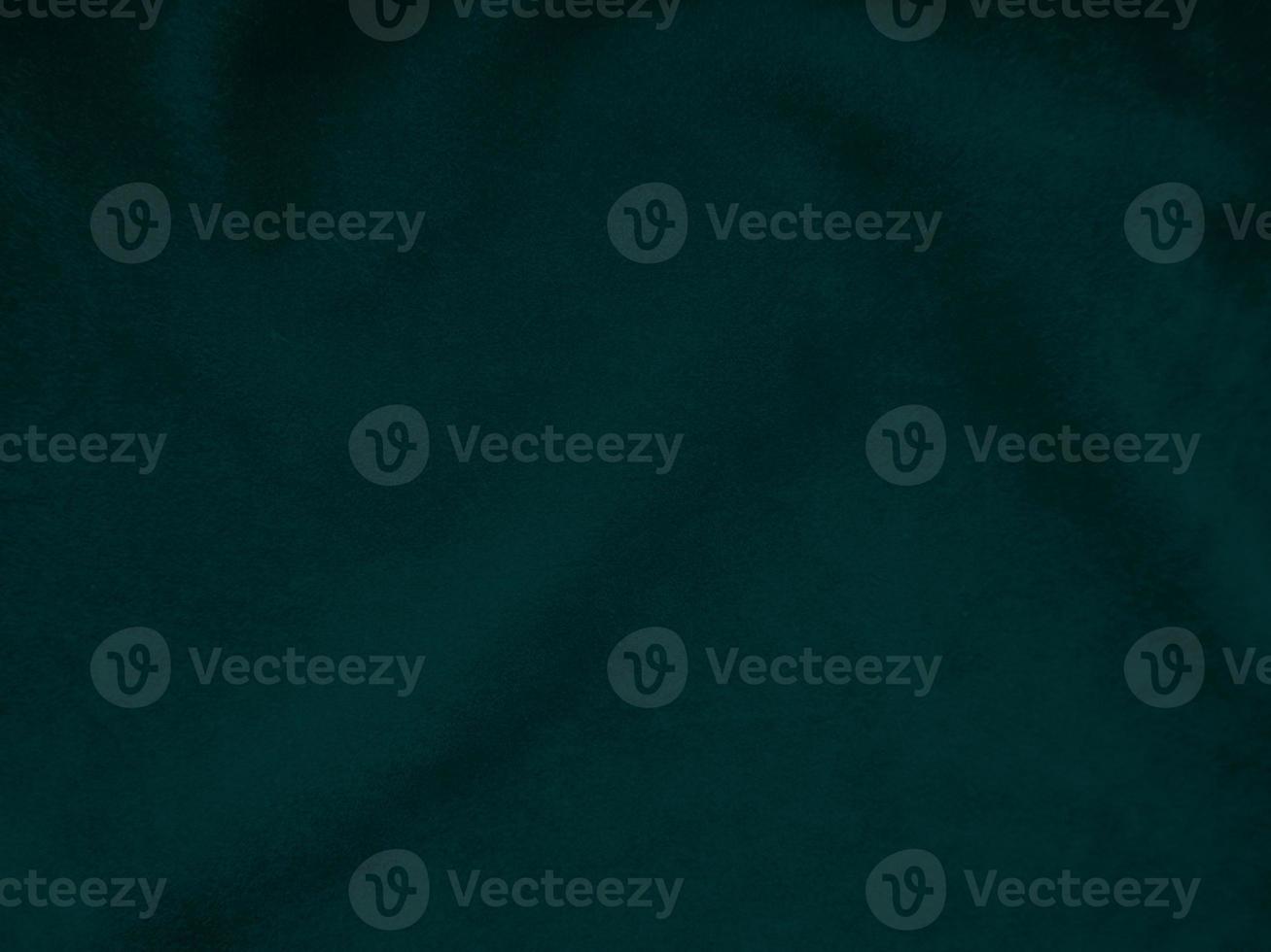Dark green old velvet fabric texture used as background. Empty green fabric background of soft and smooth textile material. There is space for text.. photo