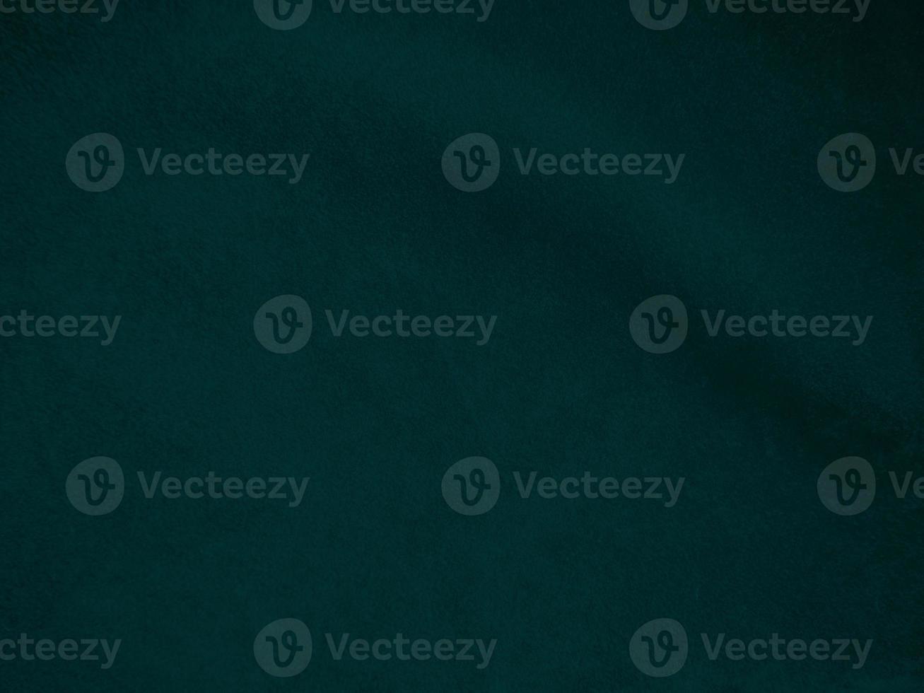 Dark green old velvet fabric texture used as background. Empty green fabric background of soft and smooth textile material. There is space for text.. photo