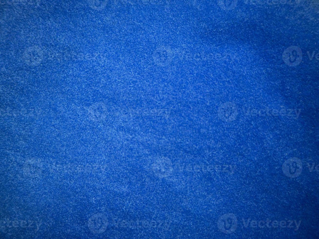 Blue velvet fabric texture used as background. Empty blue fabric background of soft and smooth textile material. There is space for text. photo