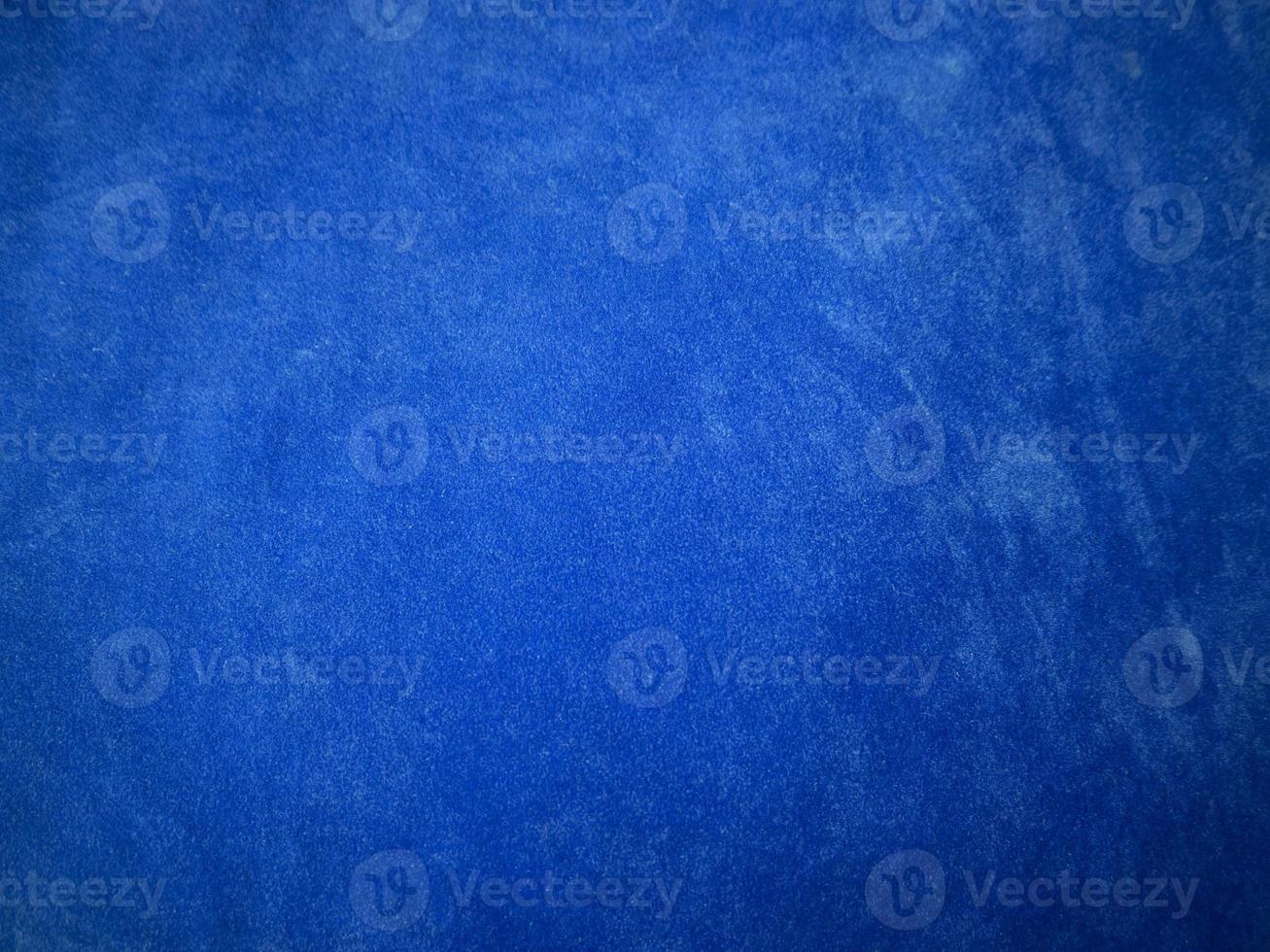Blue velvet fabric texture used as background. Empty blue fabric background of soft and smooth textile material. There is space for text. photo