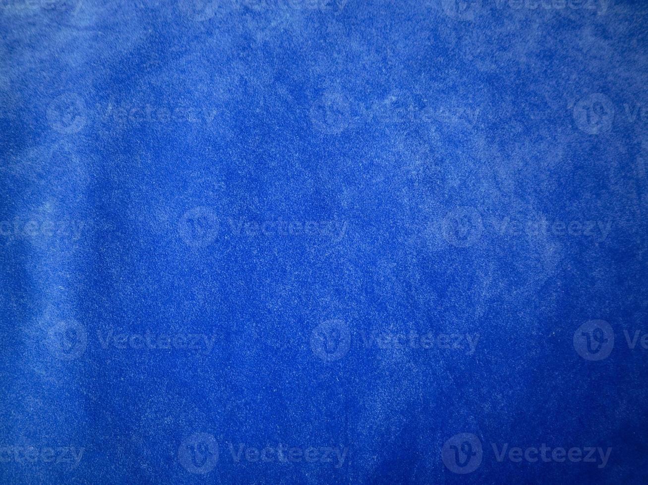 Blue velvet fabric texture used as background. Empty blue fabric background of soft and smooth textile material. There is space for text. photo