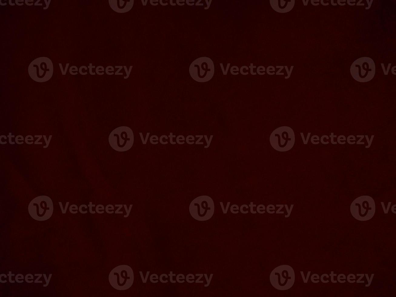 Dark red velvet fabric texture used as background. Empty dark red fabric background of soft and smooth textile material. There is space for text. photo