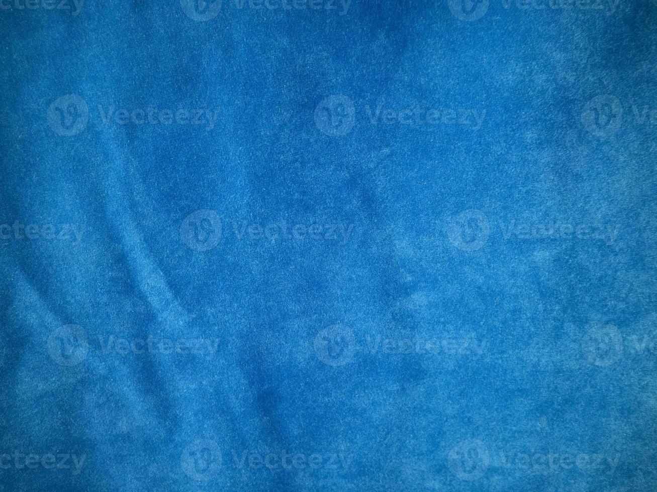 Blue velvet fabric texture used as background. Empty blue fabric background of soft and smooth textile material. There is space for text. photo