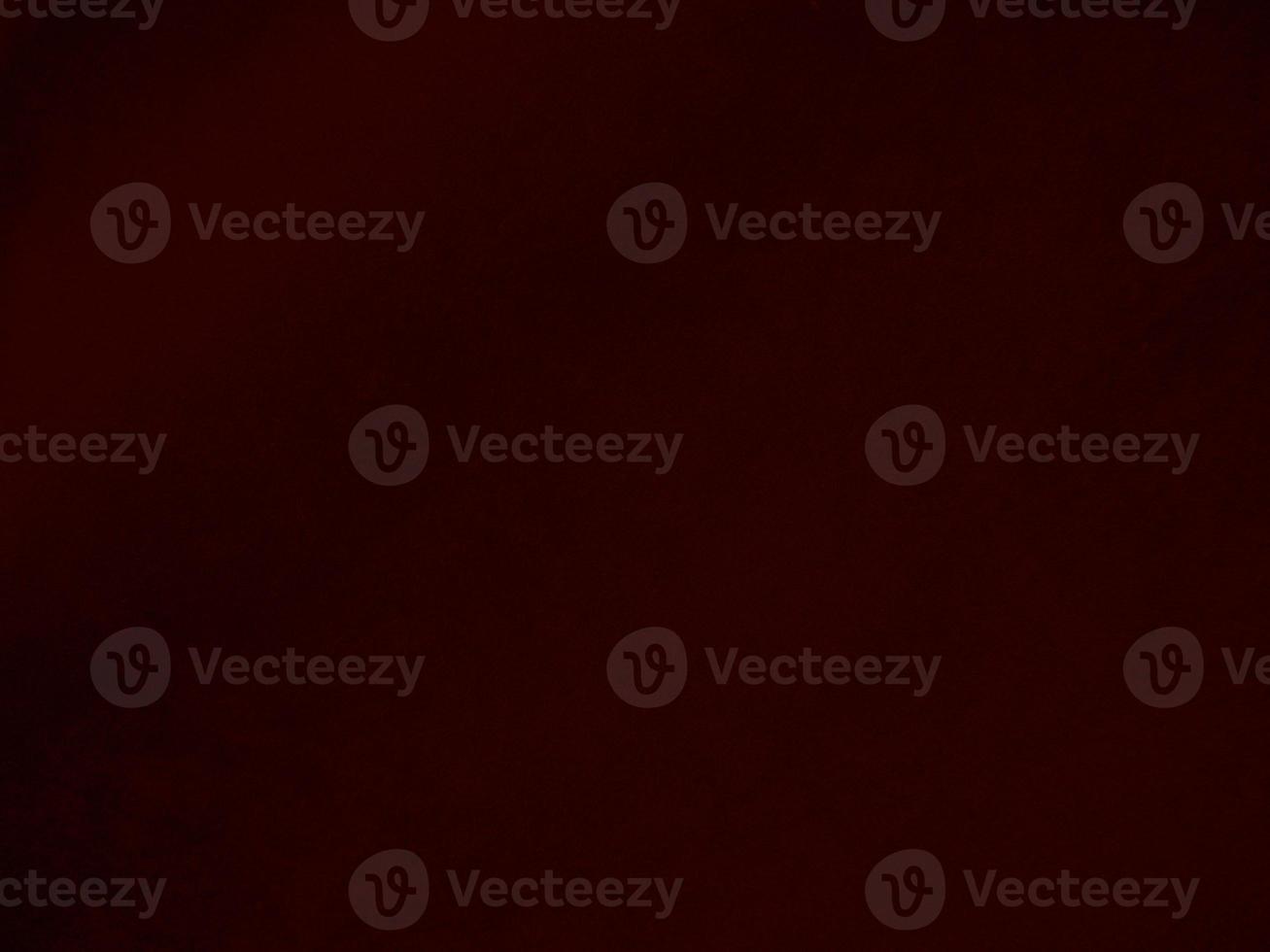 Dark red velvet fabric texture used as background. Empty dark red fabric background of soft and smooth textile material. There is space for text. photo
