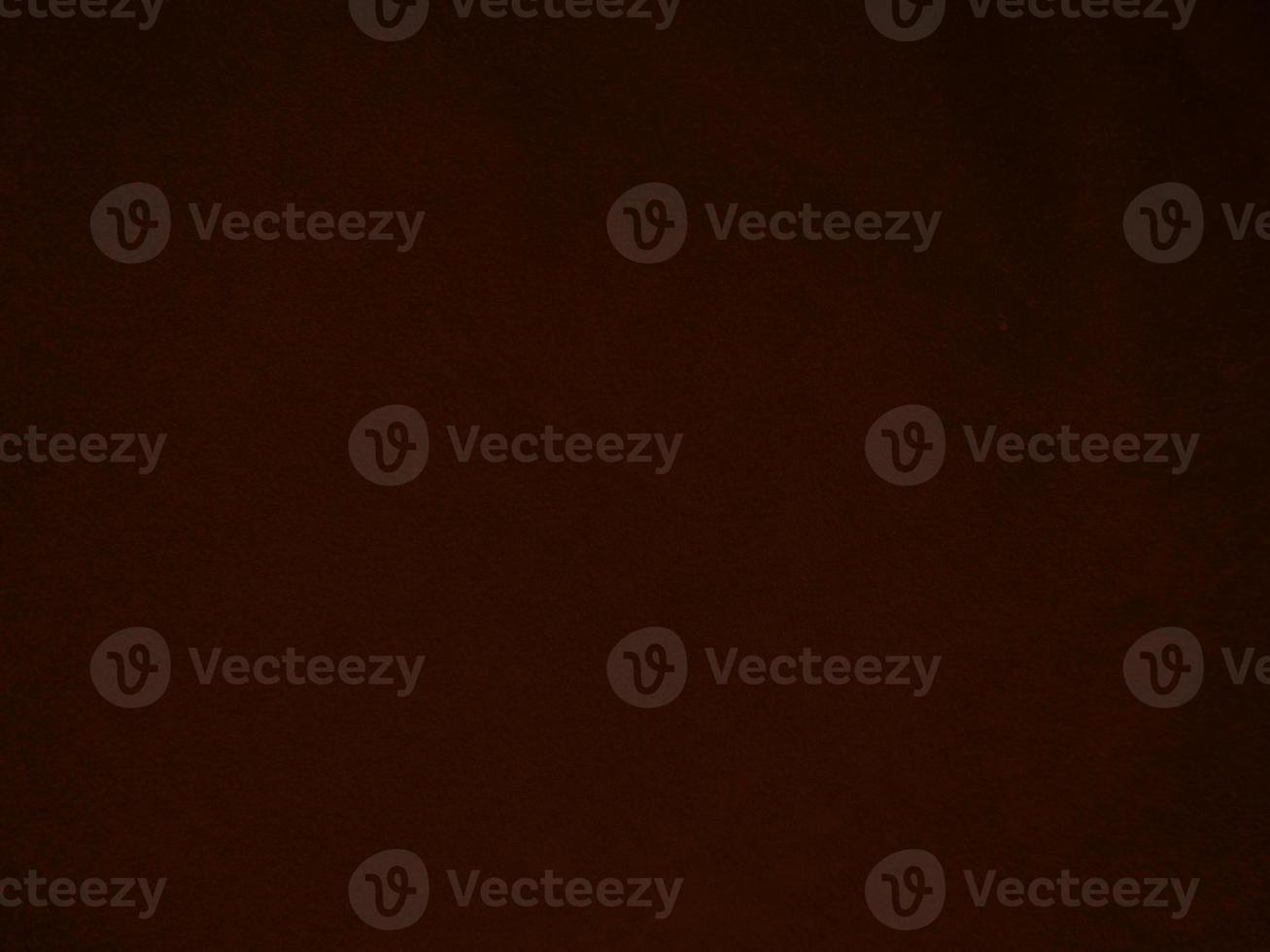 Dark red velvet fabric texture used as background. Empty dark red fabric background of soft and smooth textile material. There is space for text. photo