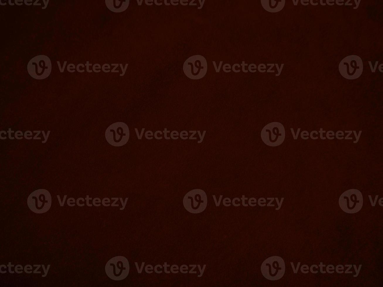 Dark red velvet fabric texture used as background. Empty dark red fabric background of soft and smooth textile material. There is space for text. photo