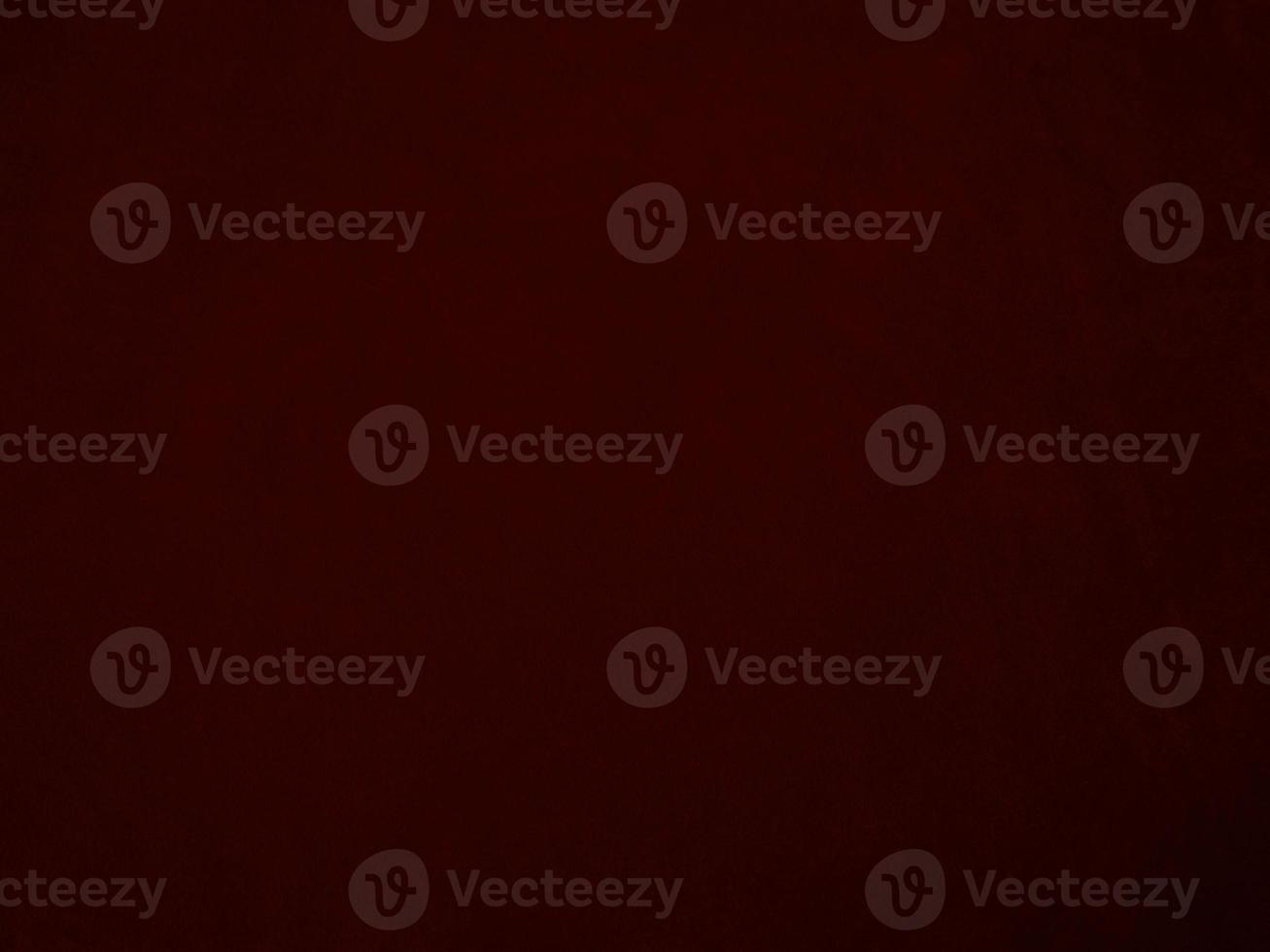 Dark red velvet fabric texture used as background. Empty dark red fabric background of soft and smooth textile material. There is space for text. photo