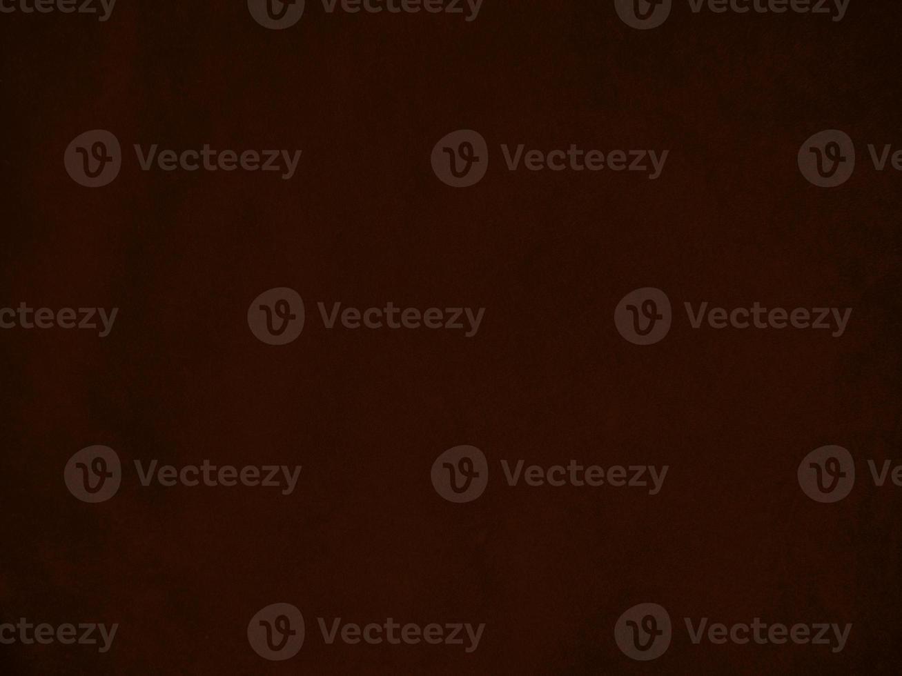 Dark red velvet fabric texture used as background. Empty dark red fabric background of soft and smooth textile material. There is space for text. photo