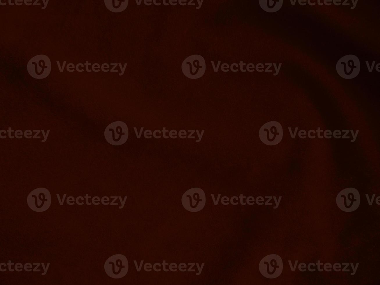 Dark red velvet fabric texture used as background. Empty dark red fabric background of soft and smooth textile material. There is space for text. photo