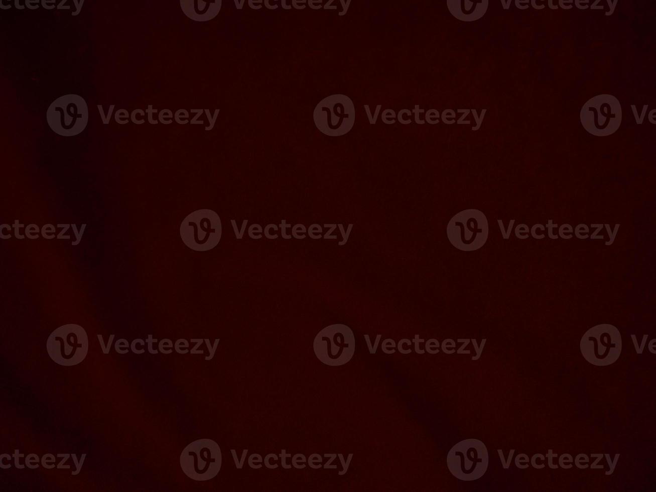 Dark red velvet fabric texture used as background. Empty dark red fabric background of soft and smooth textile material. There is space for text. photo