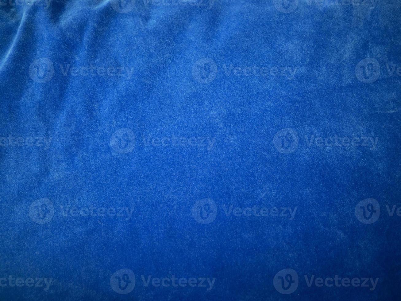 Blue velvet fabric texture used as background. Empty blue fabric background of soft and smooth textile material. There is space for text. photo