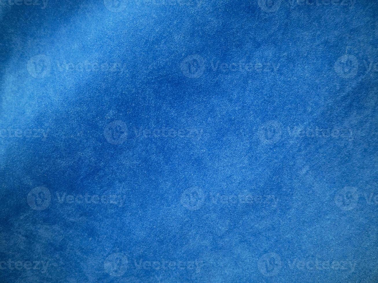 Blue velvet fabric texture used as background. Empty blue fabric background of soft and smooth textile material. There is space for text. photo