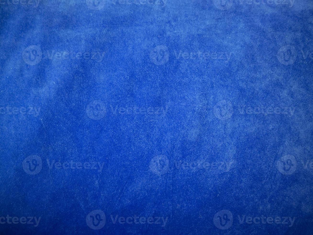 Blue velvet fabric texture used as background. Empty blue fabric background of soft and smooth textile material. There is space for text. photo