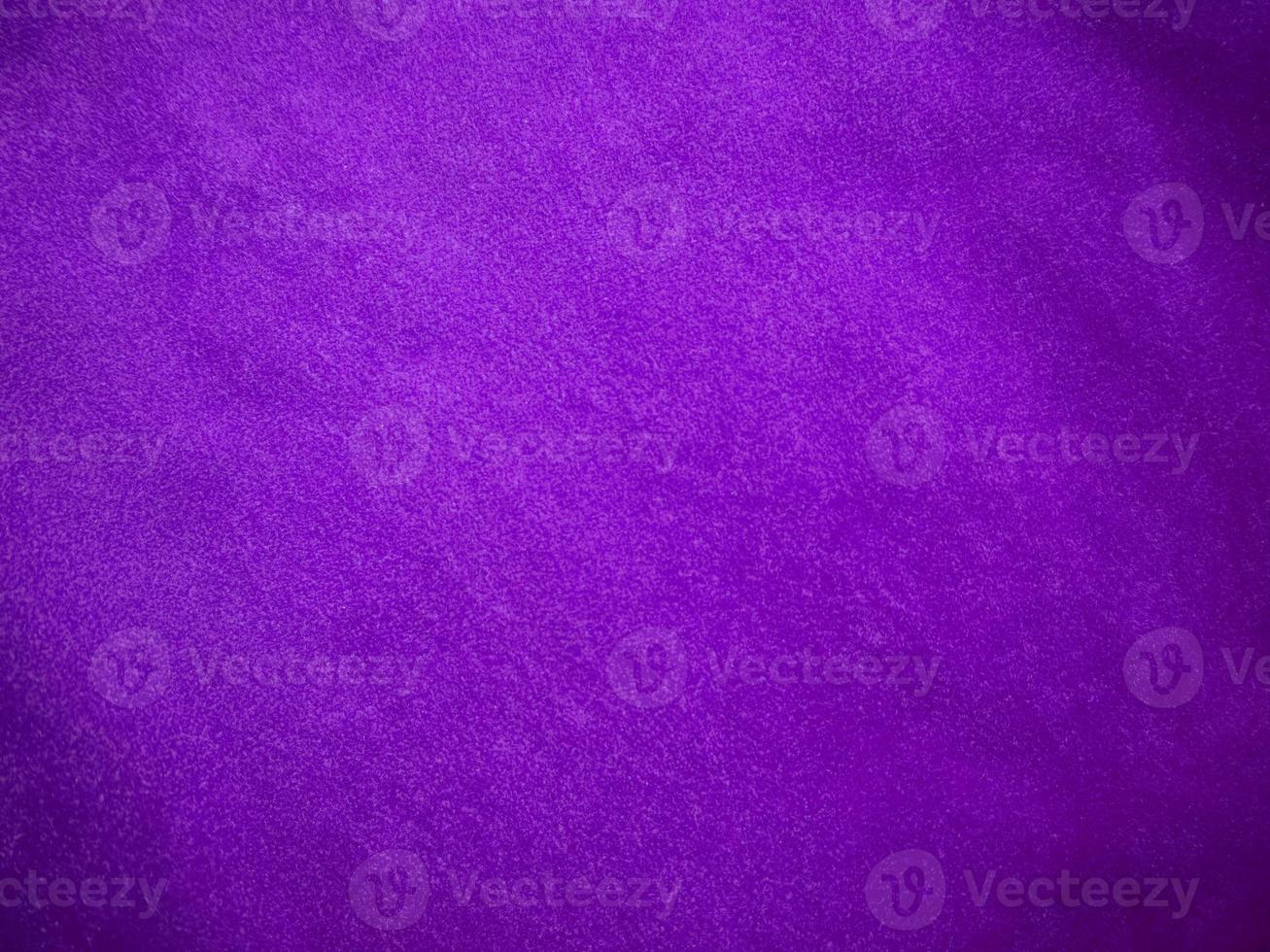 Purple velvet fabric texture used as background. Luxury violet fabric background of soft and smooth textile material. There is space for text. photo