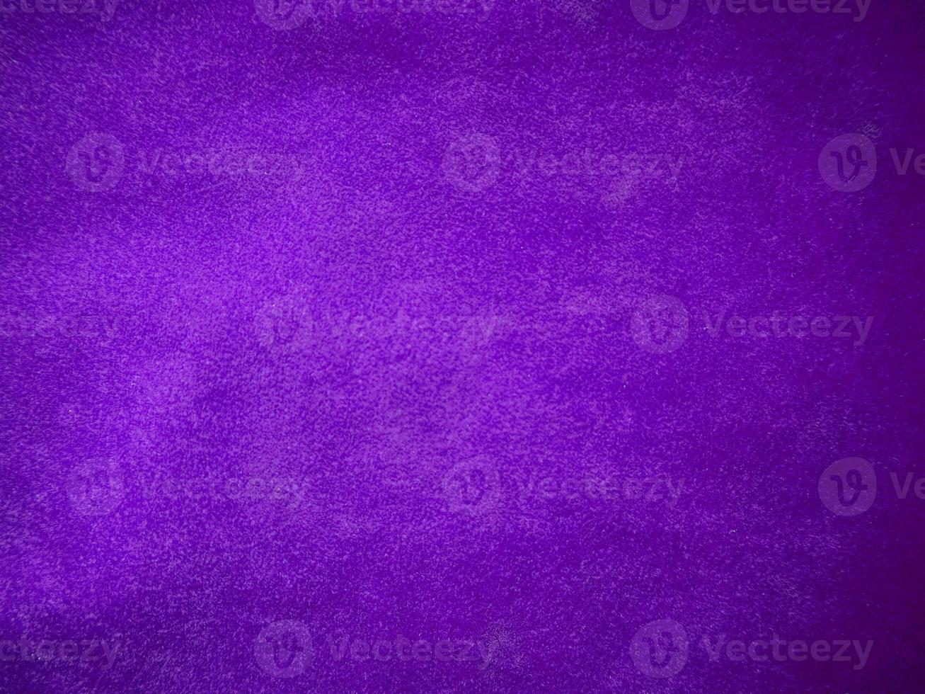 Purple velvet fabric texture used as background. Luxury violet fabric background of soft and smooth textile material. There is space for text. photo