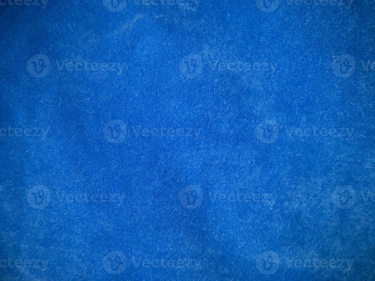 Blue velvet fabric texture used as background. Empty blue fabric background of soft and smooth textile material. There is space for text. photo