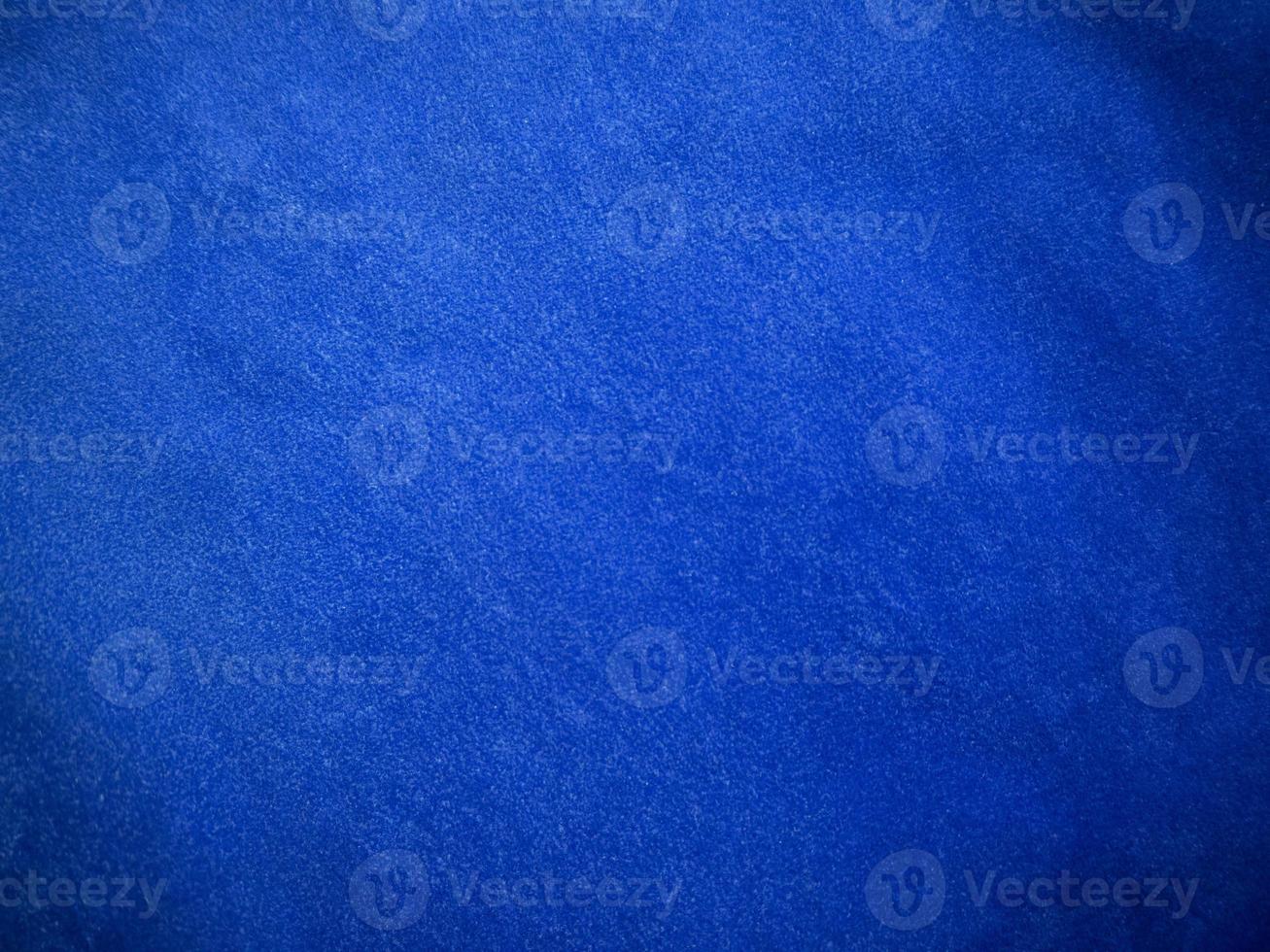 Blue velvet fabric texture used as background. Empty blue fabric background of soft and smooth textile material. There is space for text. photo