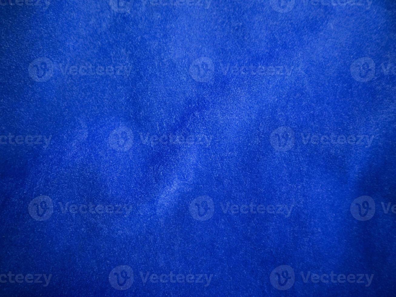 Blue velvet fabric texture used as background. Empty blue fabric background of soft and smooth textile material. There is space for text. photo