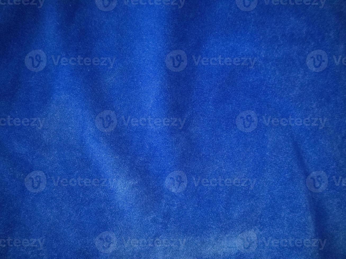Blue velvet fabric texture used as background. Empty blue fabric background of soft and smooth textile material. There is space for text. photo