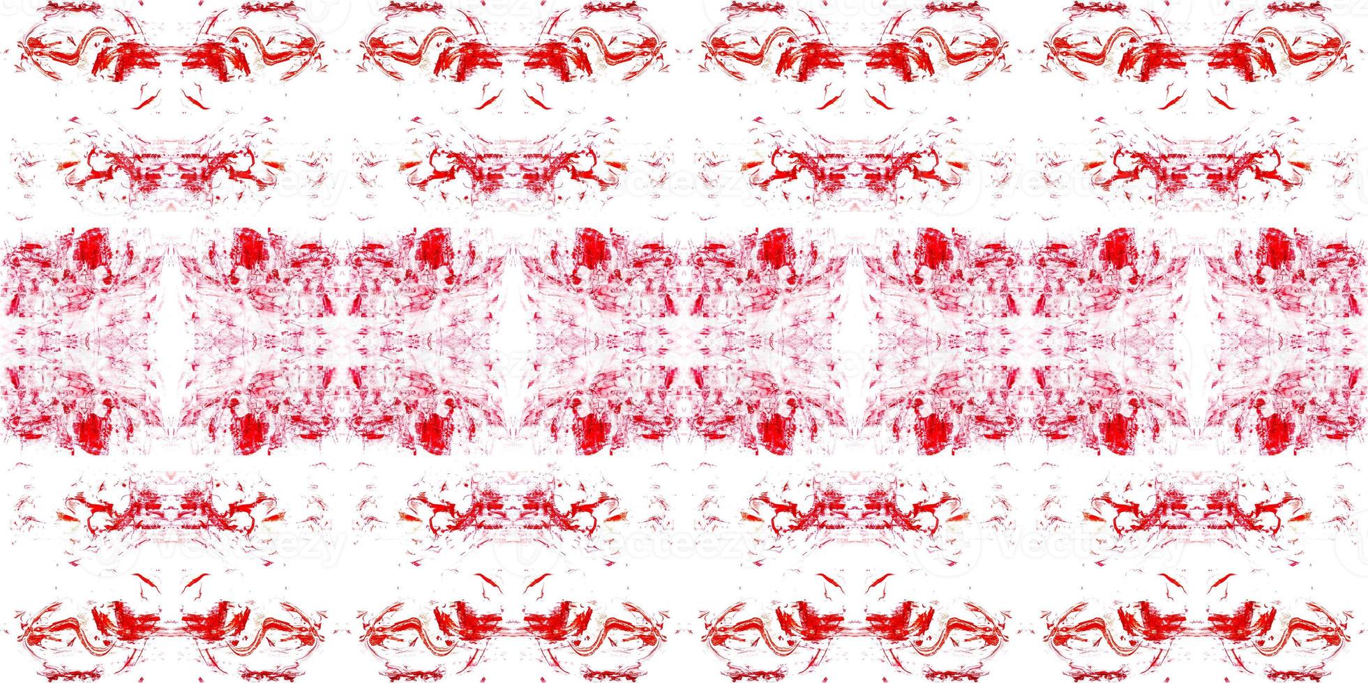 Abstract strokes of red paints in a kaleidoscope. photo