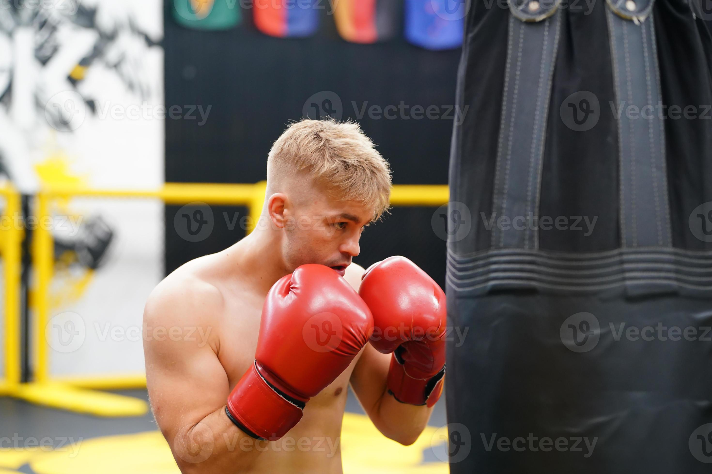 Muay Thai, The martial art of Thailand, Boxer practicing punching with punching bag to build