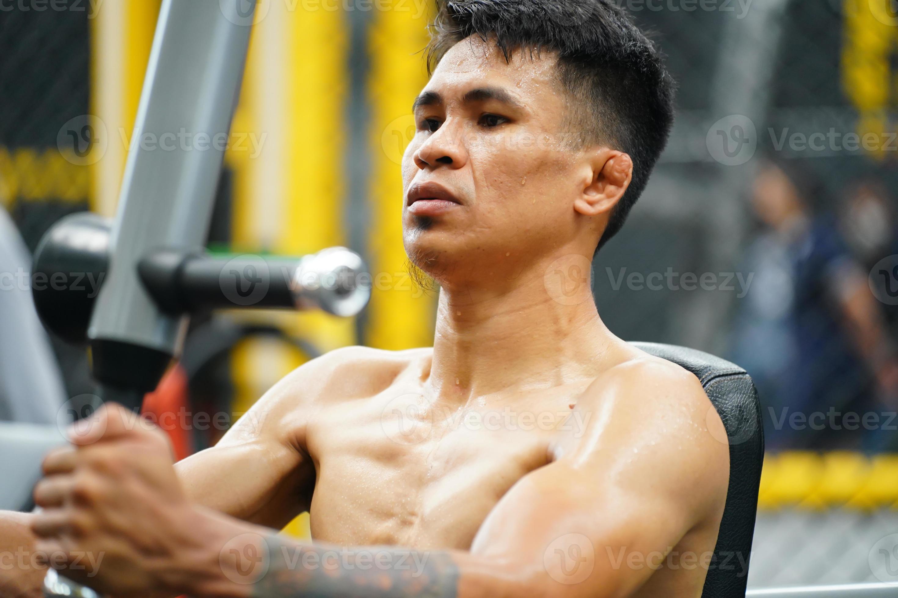 Mixed martial arts fighter going to the gym to build strong muscles To