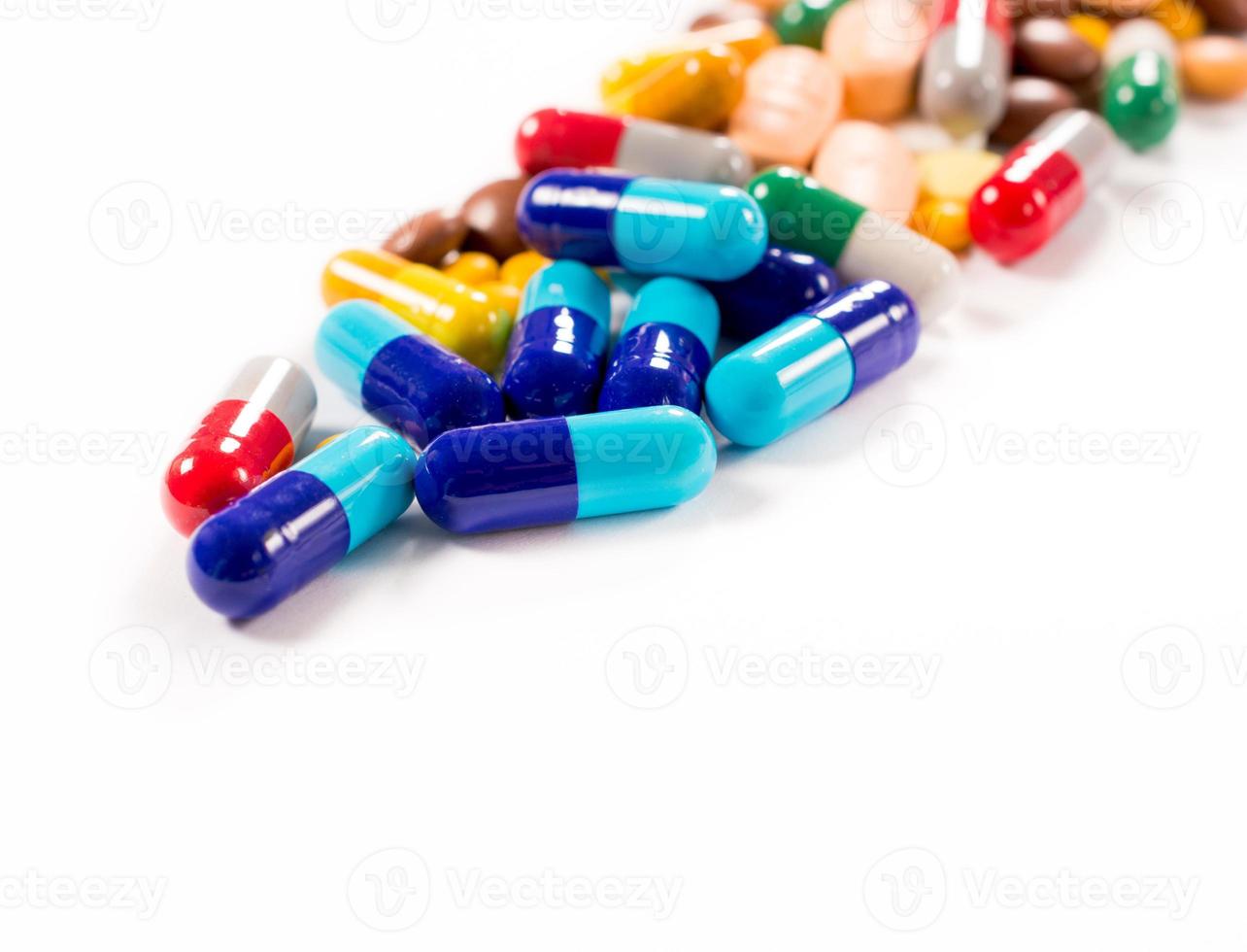 Pills on white background photo