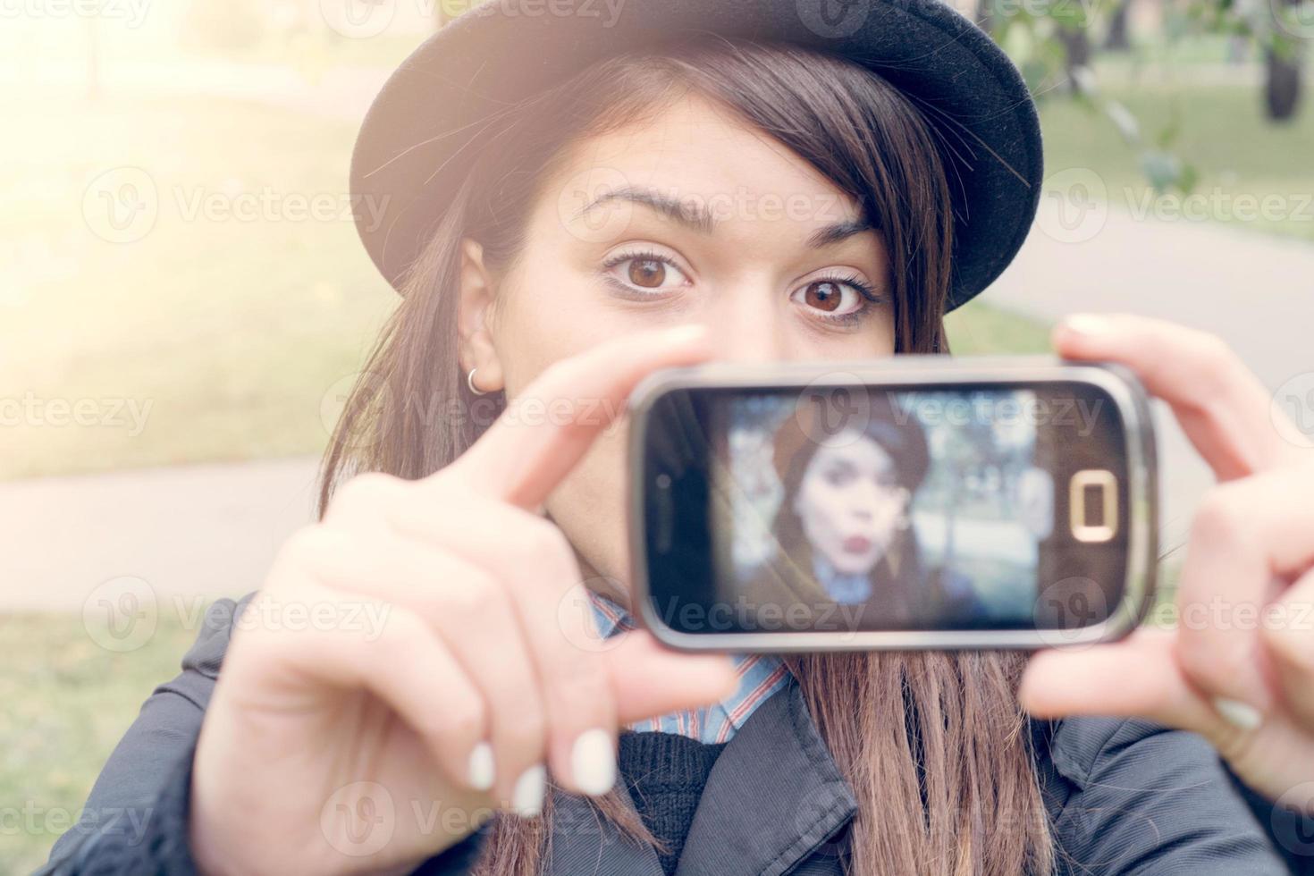 Female making selfie photo