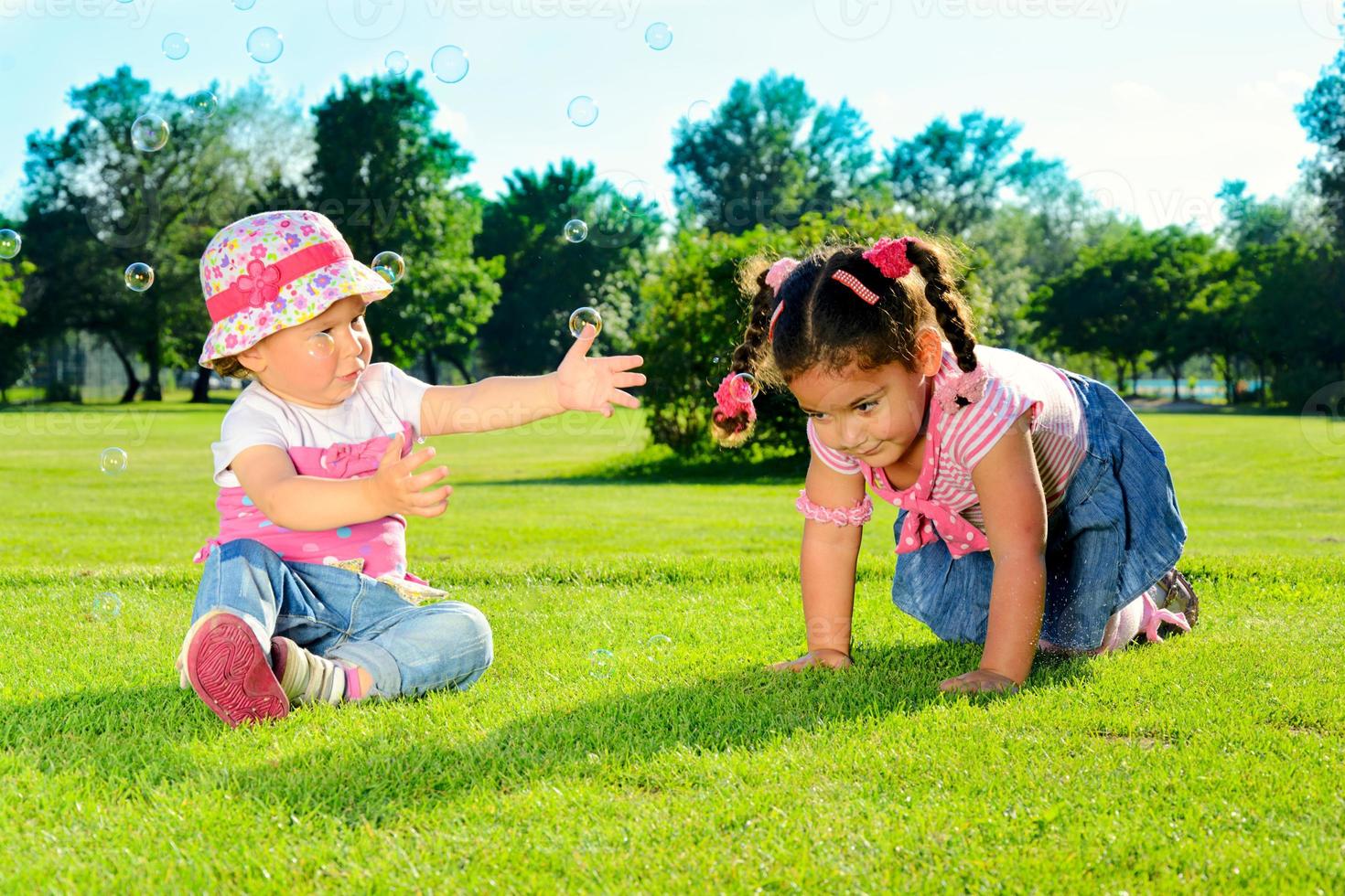 Two little girls on the field photo