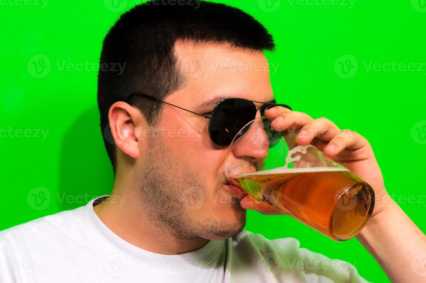 Man drinking beer photo