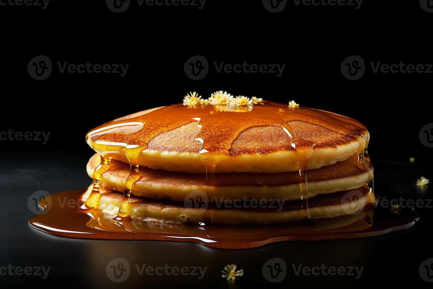 Pancake, a pancake with honey. Black background. photo