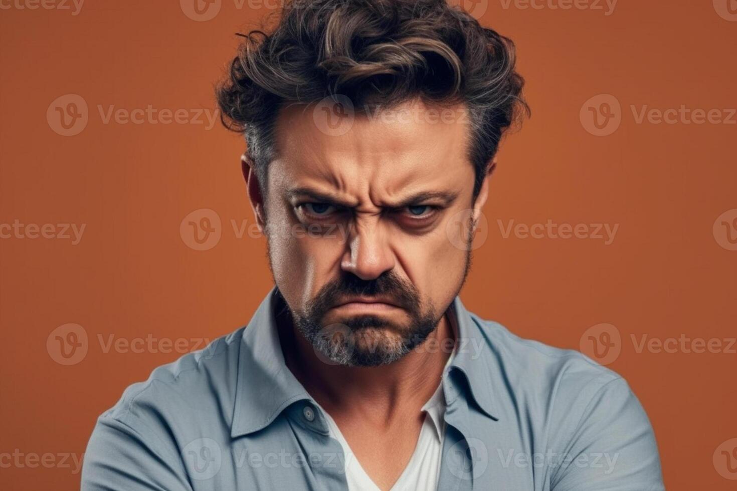 a man on solid color background photoshoot with Anger face experession photo
