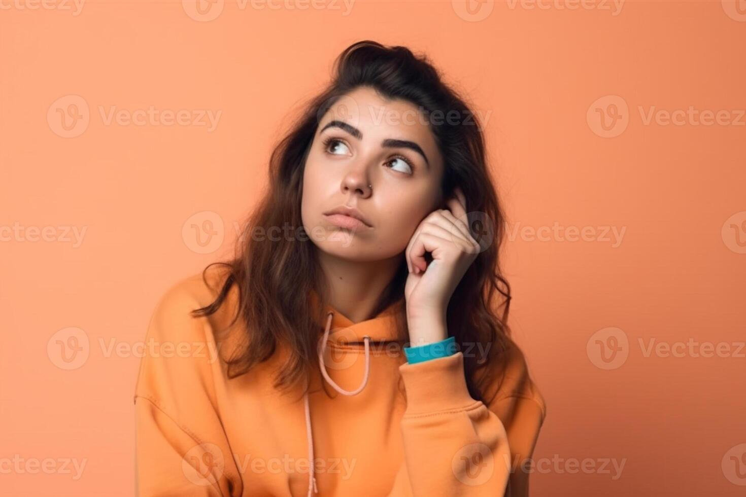 a Young woman thinking an idea while looking up photo