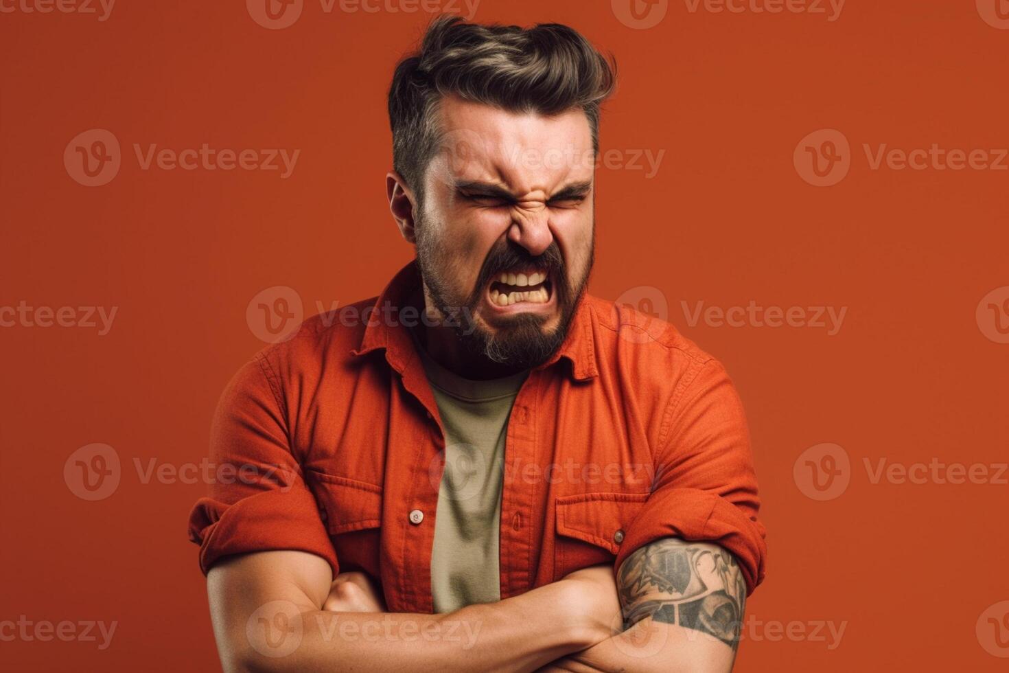 a man on solid color background photoshoot with Anger face experession photo